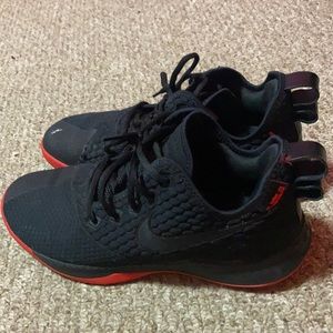Red and black Nike vol 1s. Basketball shoes